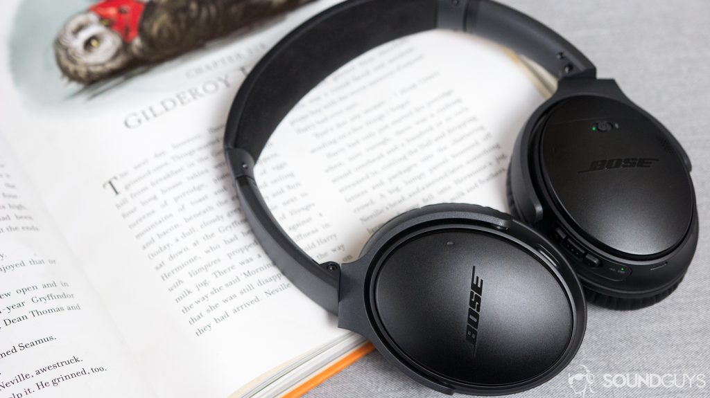The Bose QuietComfort 35 II resting on an open book.