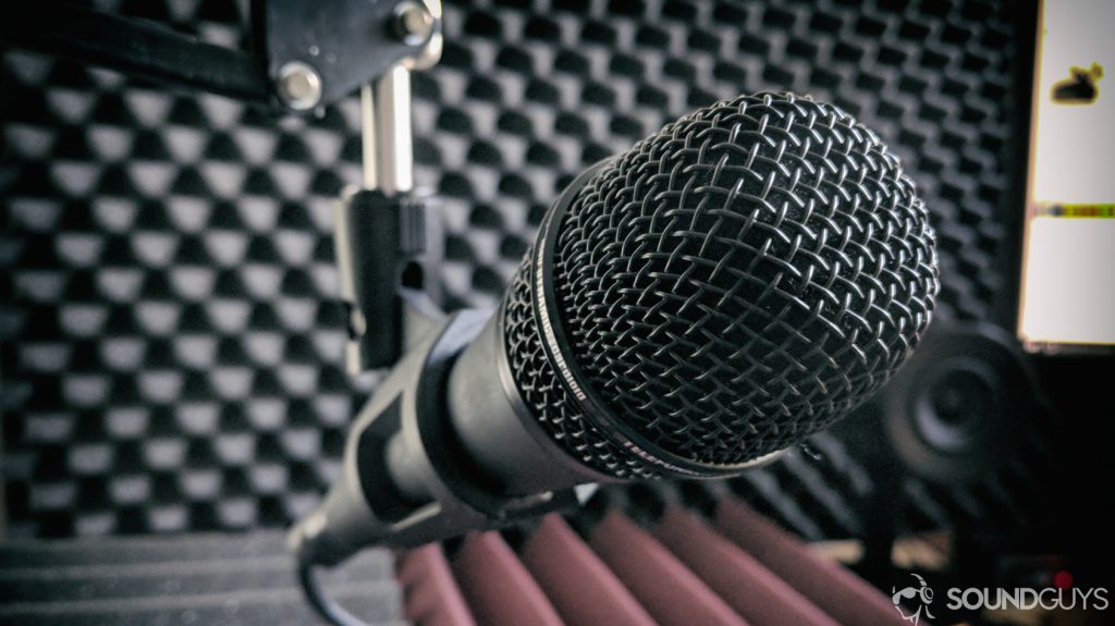 A photo of a microphone in a recording studio.