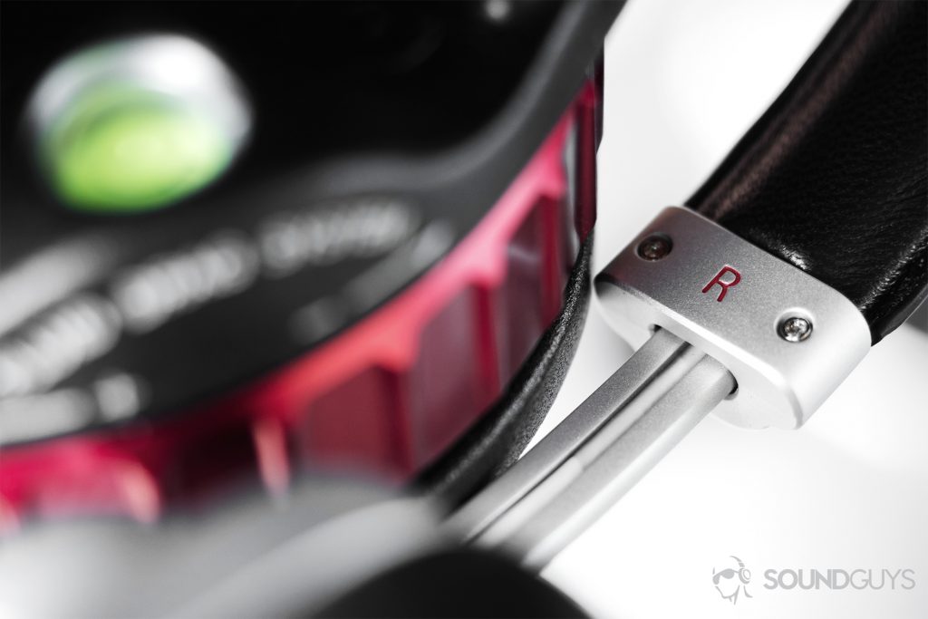 Master & Dynamic MW50 Wireless review: A close-up of hte R on the interior of the headband. It's nice laser etched letter in red.