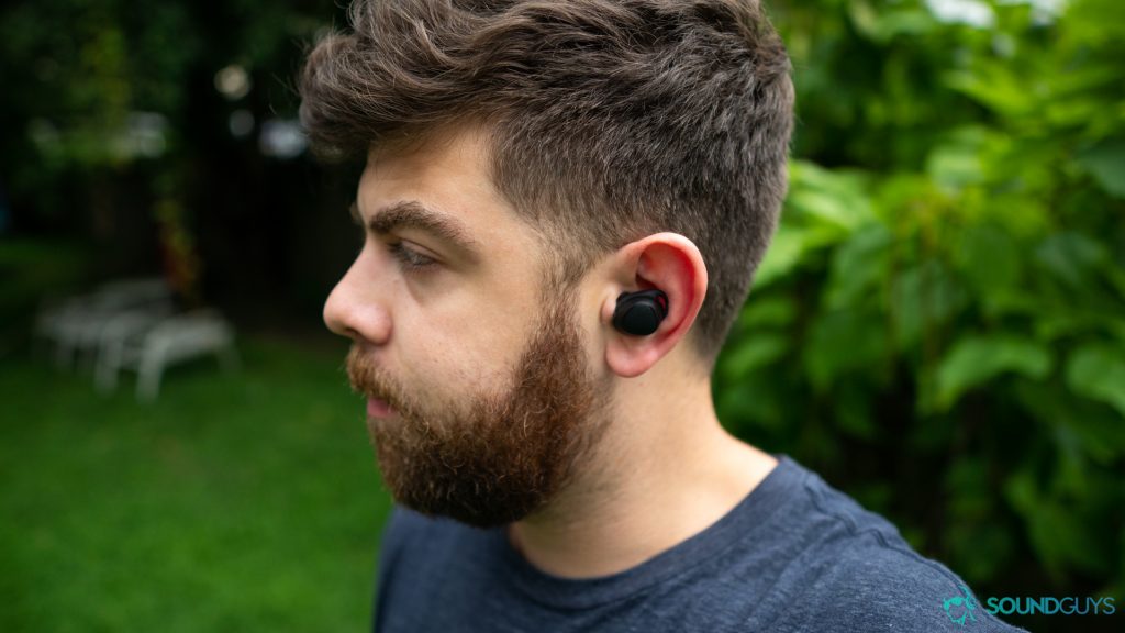 Wearing the Samsung Gear IconX to show how they look in the ear.
