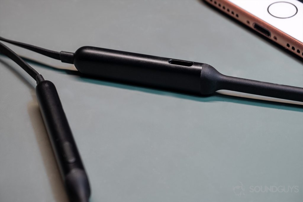 The BeatsX neckband where the Lightning charging port is located.
