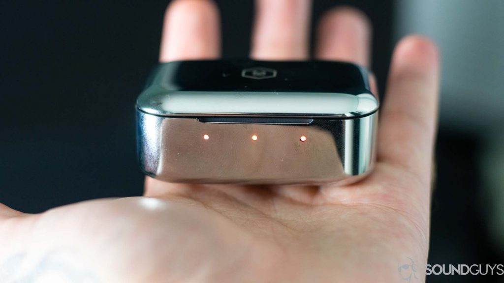 Close-up of the MW07 charging case in hand.