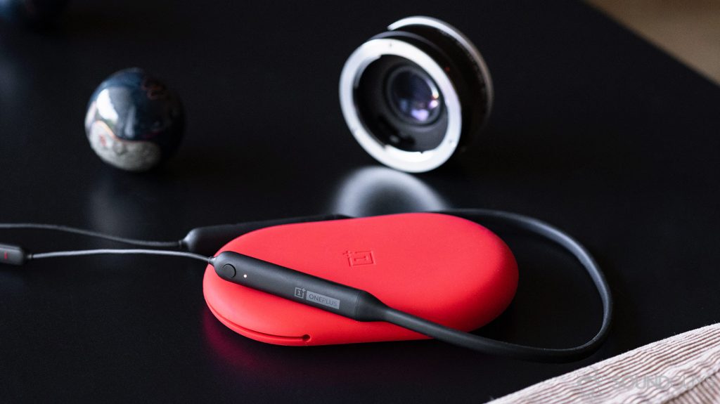 A picture of the OnePlus Bullets Wireless 2's shortcut button and lit LED.