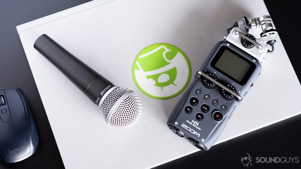 Shure SM58 microphone next to a Zoom H5 handheld voice recorder - one of the best cheap voice recorder