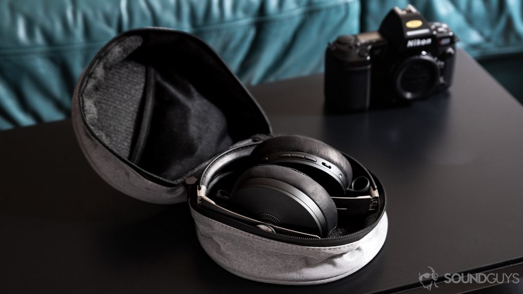 A photo of the Sennheiser Momentum Wireless 3 headphones folded in the grey carrying case.