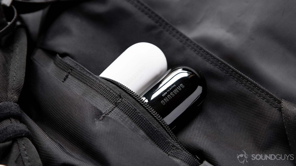 A picture of the Samsung Galaxy Buds Plus and Galaxy Buds true wireless charging cases in black and white, respectively.