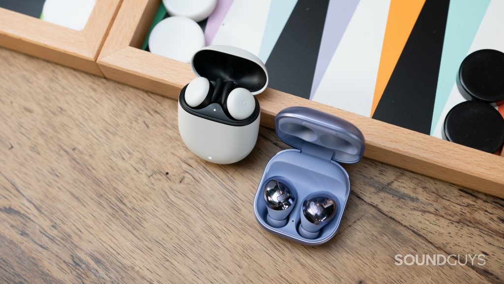 The Google Pixel Buds in the open case next to the Samsung Galaxy Buds Pro.