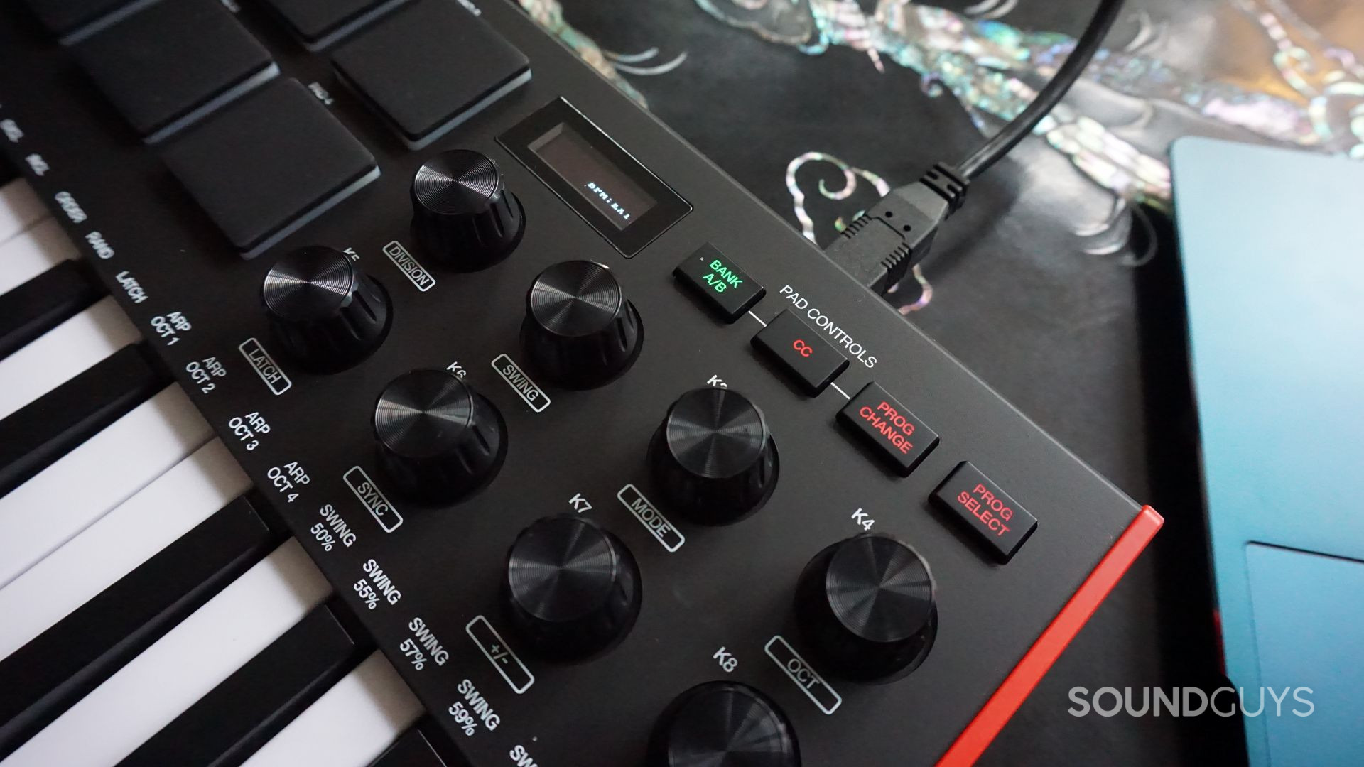 The AKAI MPK Mini MK3 displays current settings on a small LED screen