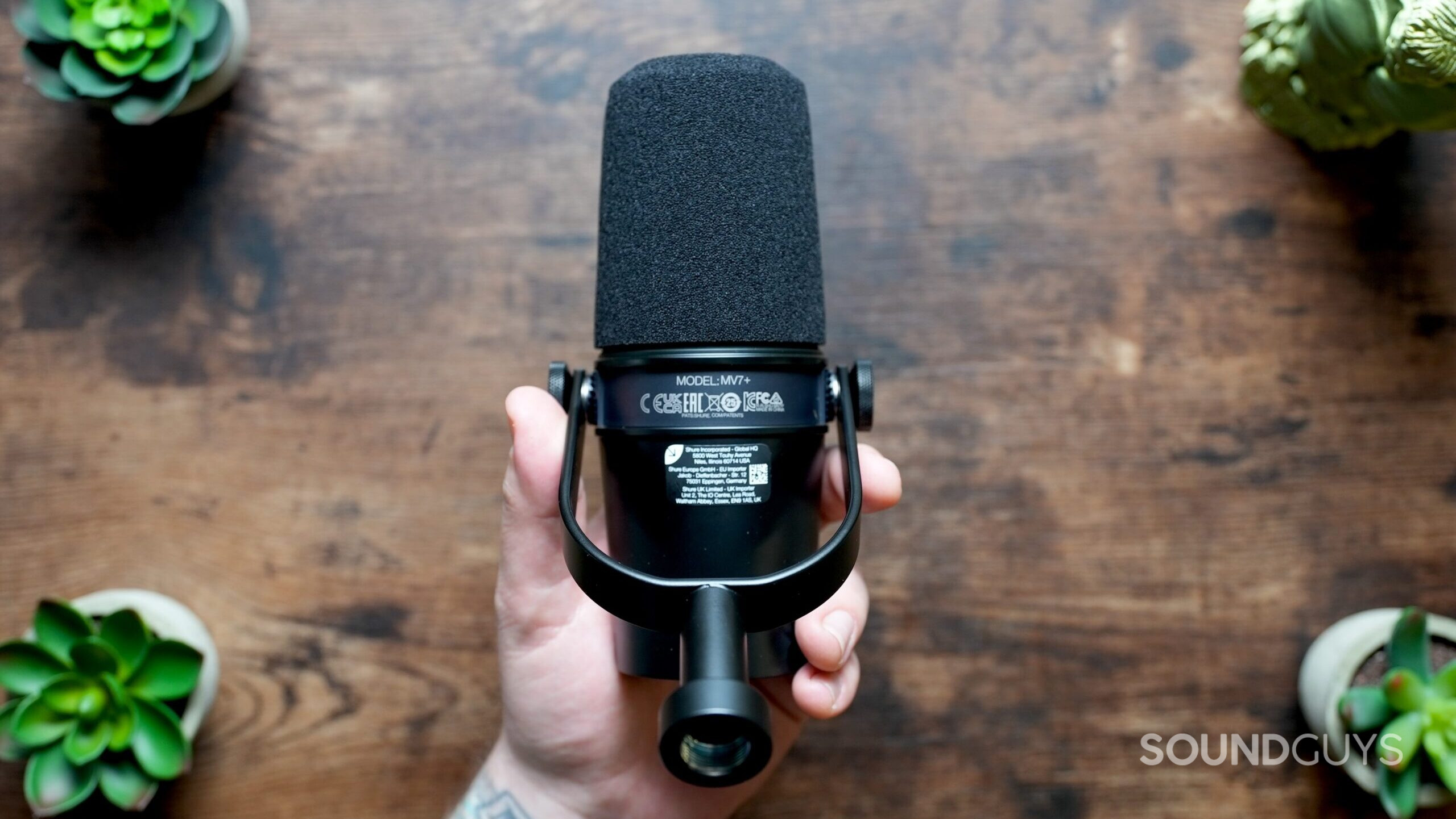 Top down shot, showing the underside of the Shure MV7+ microphone.