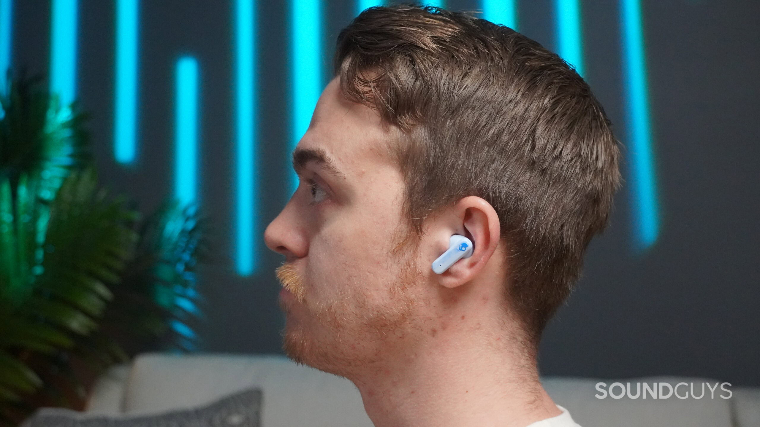 a man earing the skullcandy ecobuds