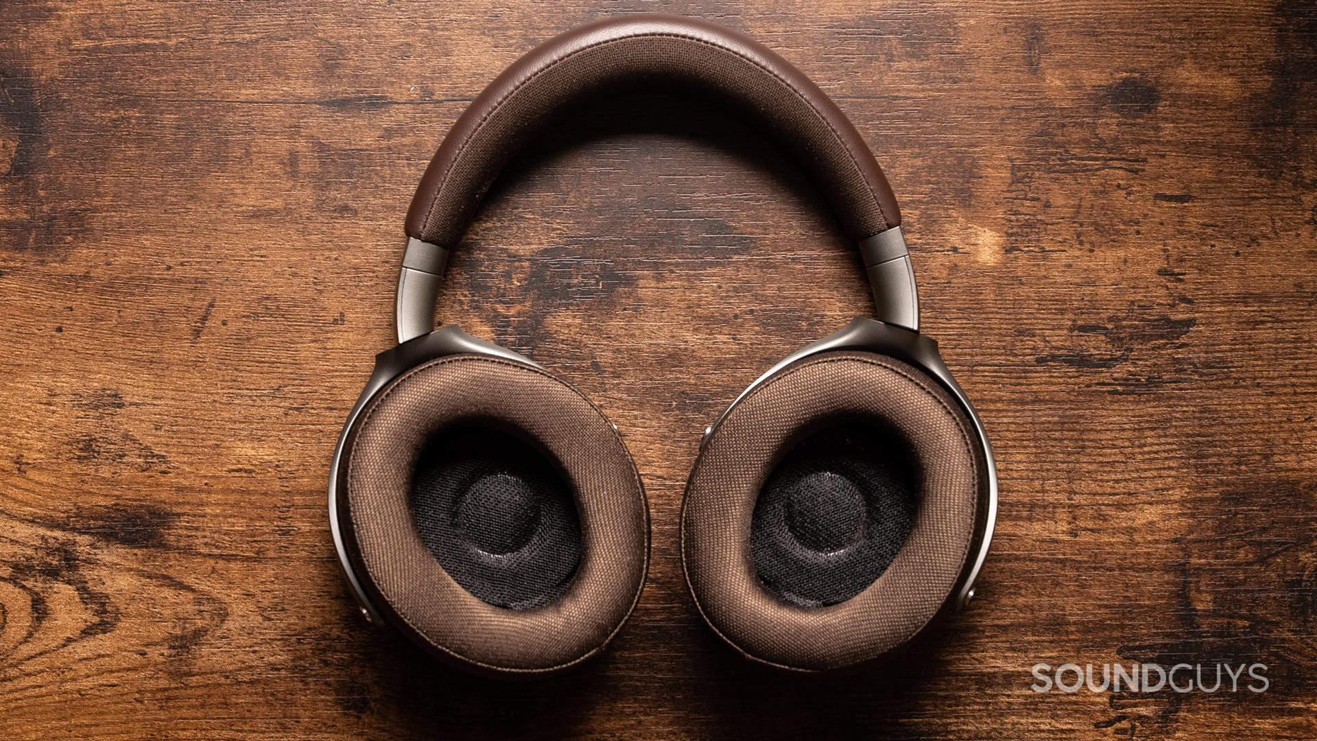 A photo of the Focal Hadenys sitting atop a wooden desk.