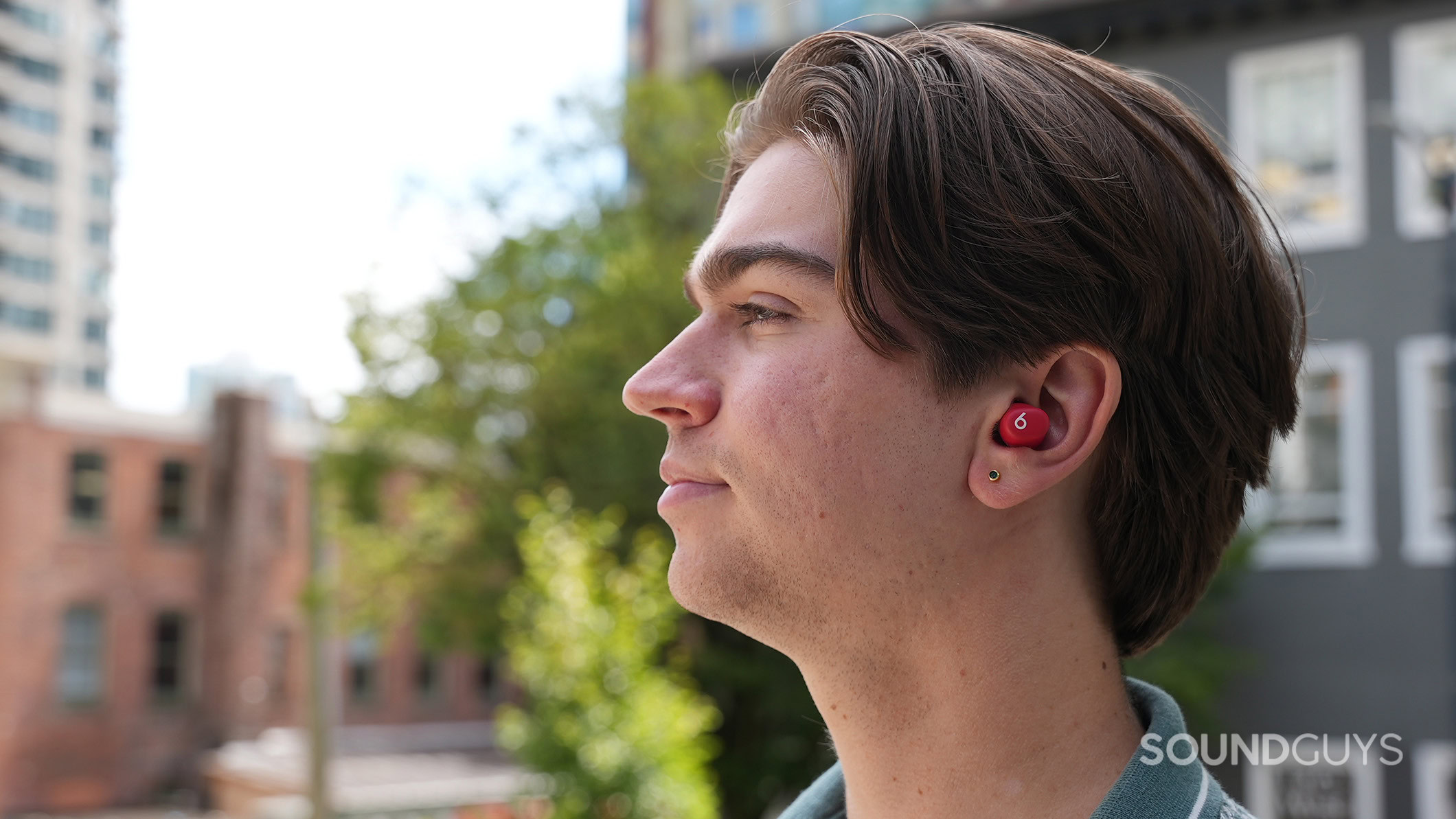 A man wearing the Beats Solo Buds.