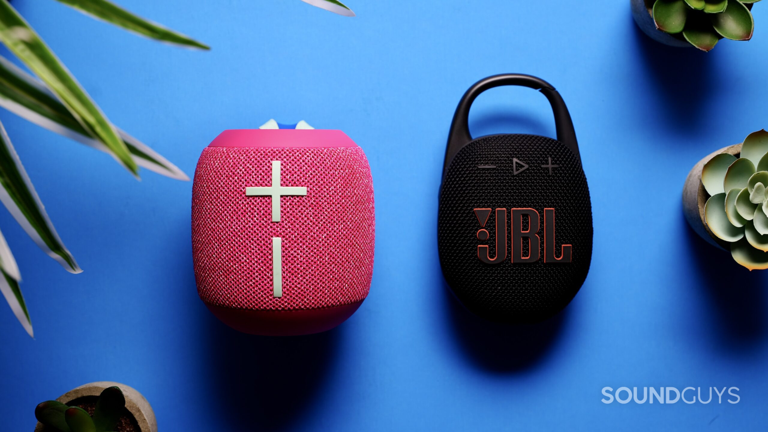 A UE Wonderboom 4 next to a JBL Clip 5