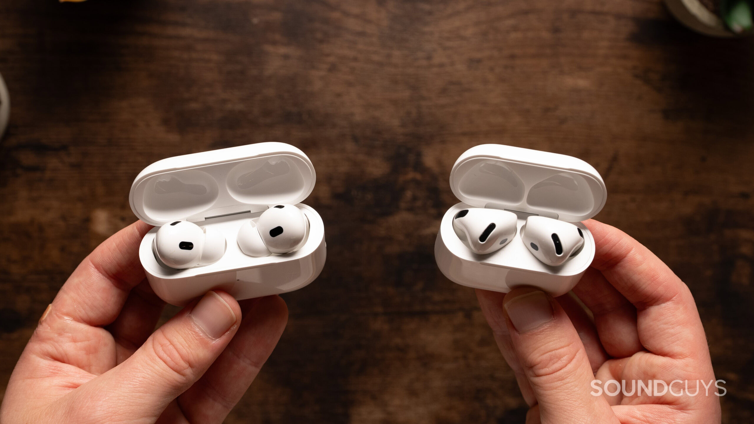 AirPods 4 with Active Noise Cancellation next to AirPods Pro 2 with case open.