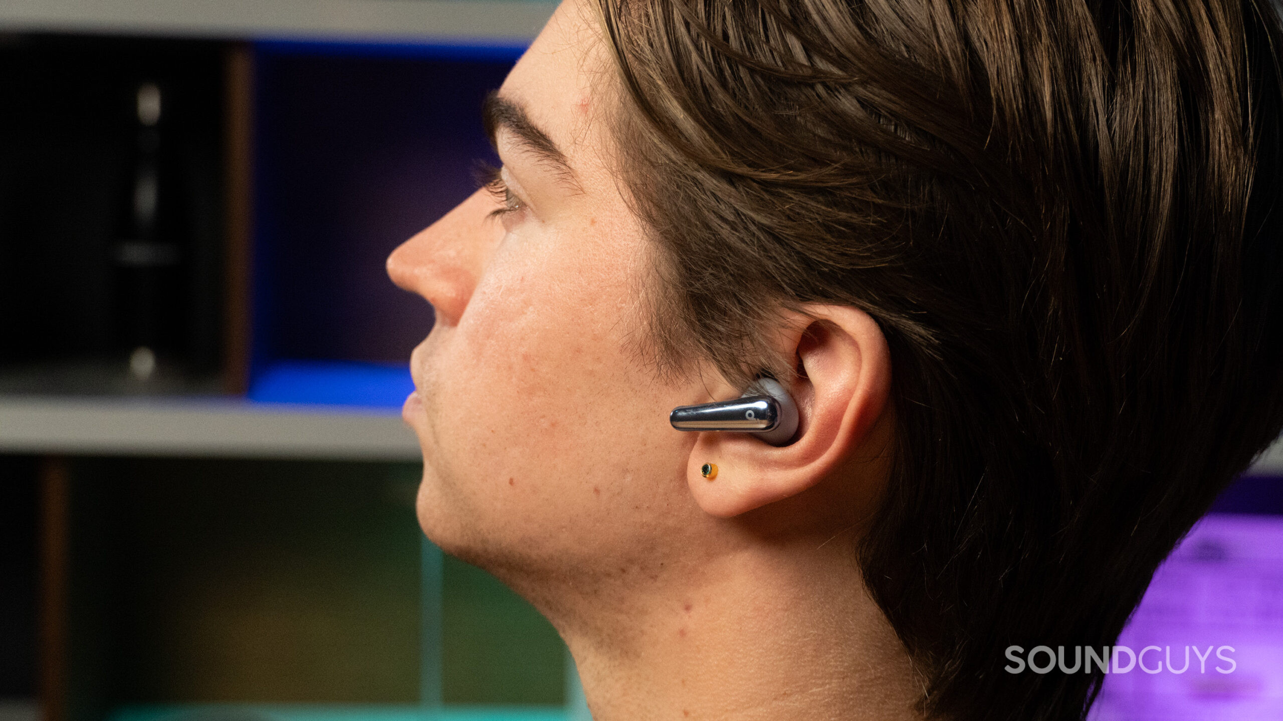 A man wearing the Anker Soundcore Liberty 4 Pro earbuds.