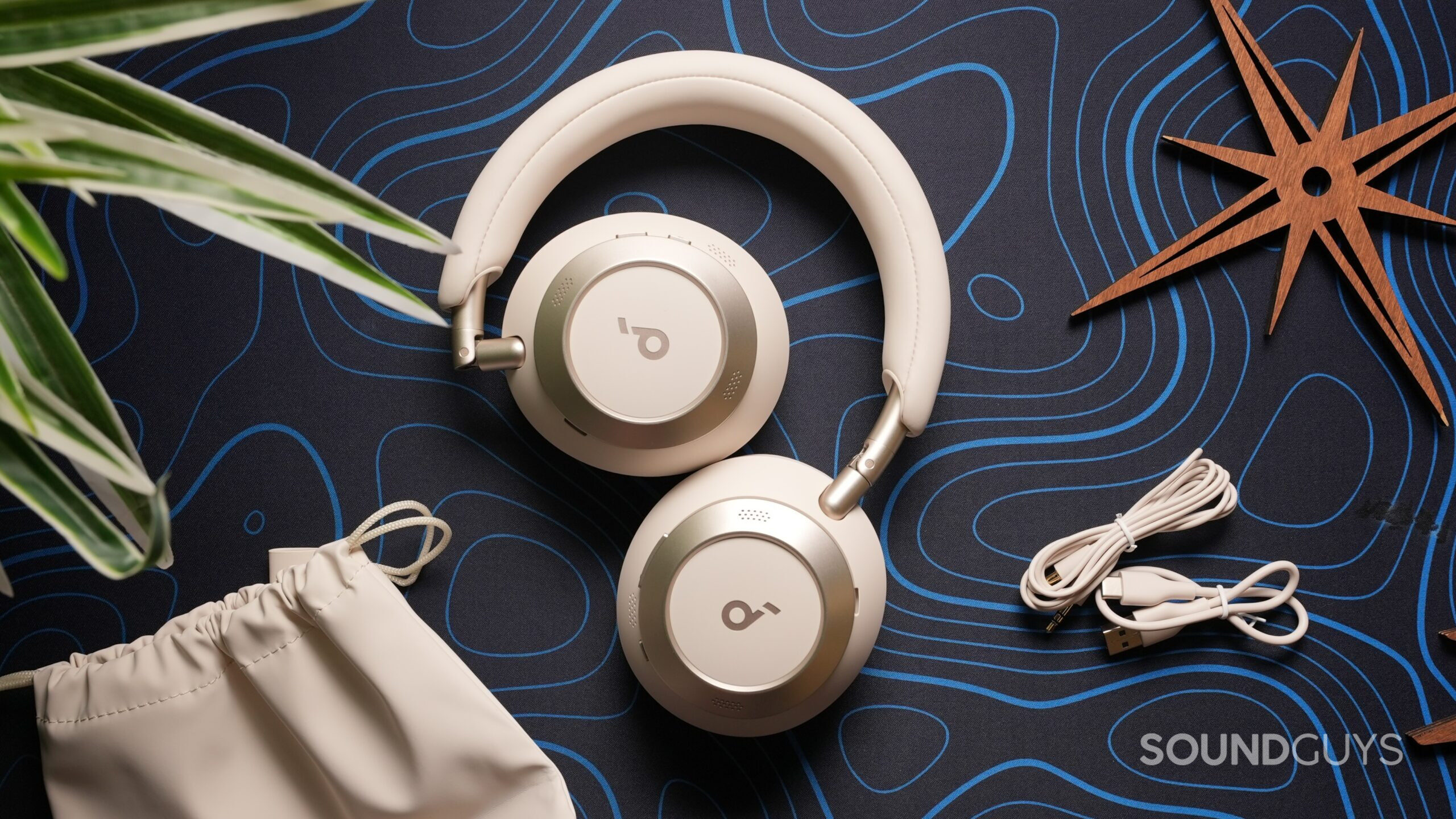 Top-down photo of the Anker Soundcore Space One Pro headphones and its accessories.