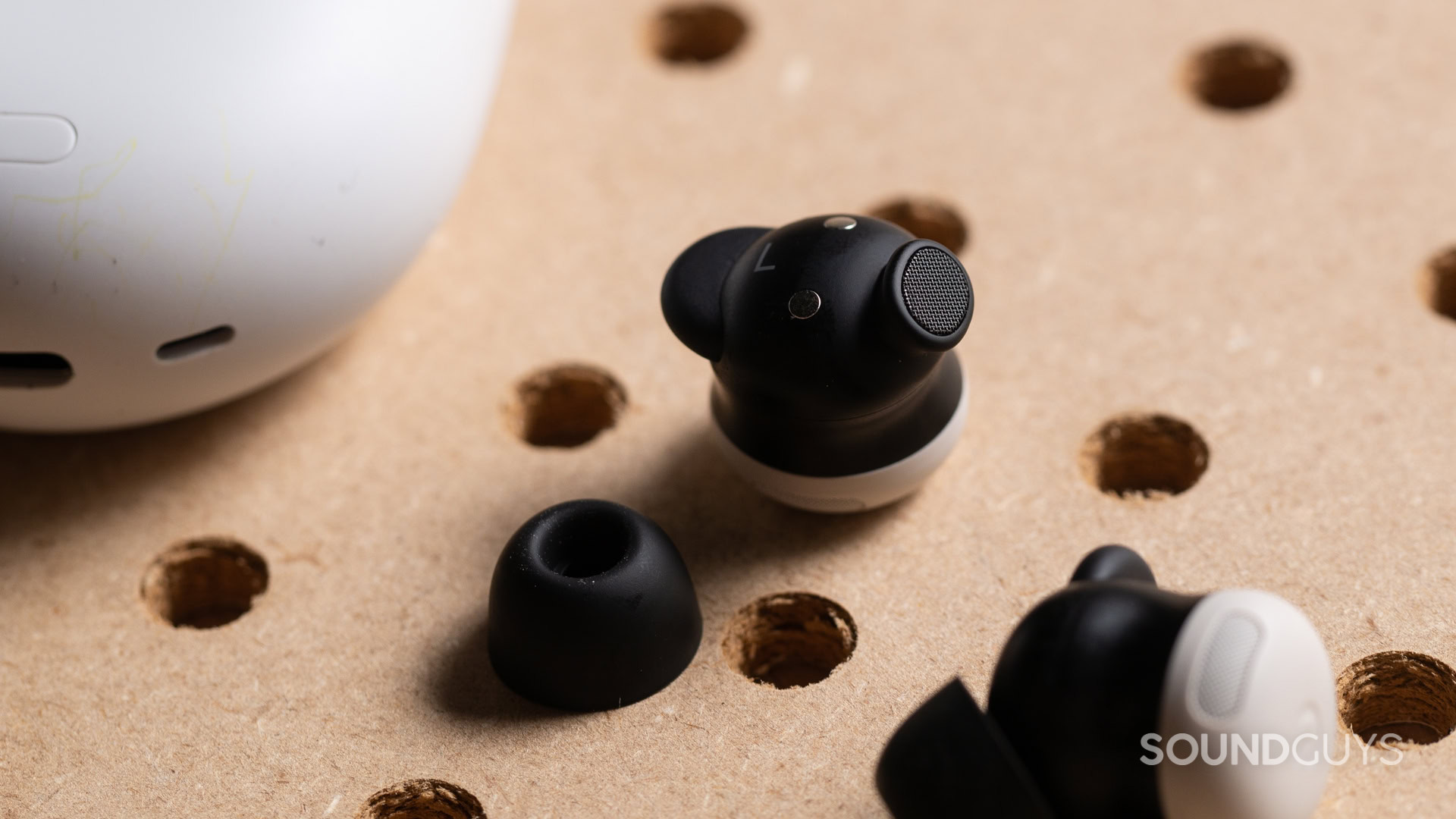 A close-up photo of the Google Pixel Buds Pro 2 with the ear tip removed.