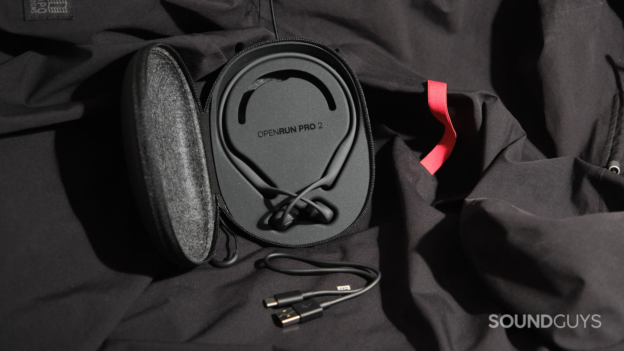 Shokz OpenRun Pro 2 headphones and accessories.