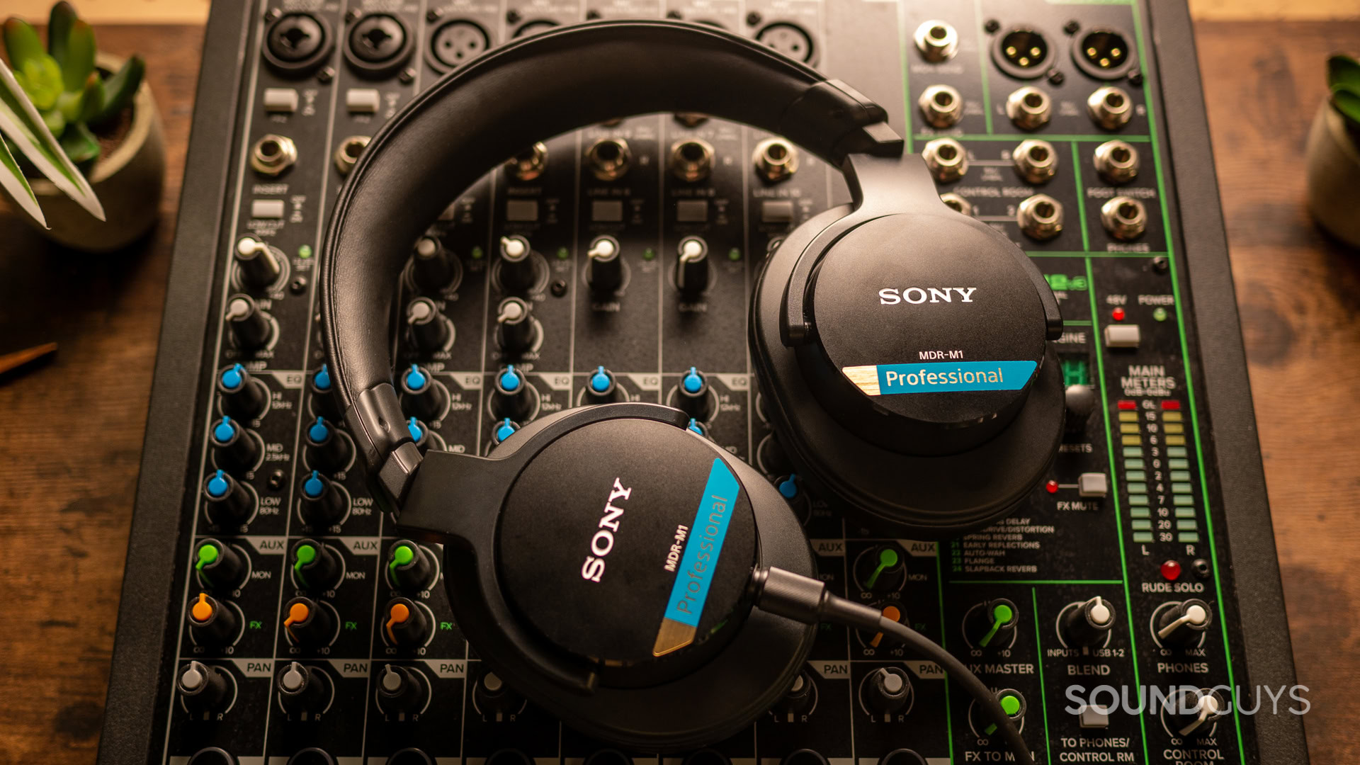 A shot of the Sony MDR-M1 sitting atop an effects board.