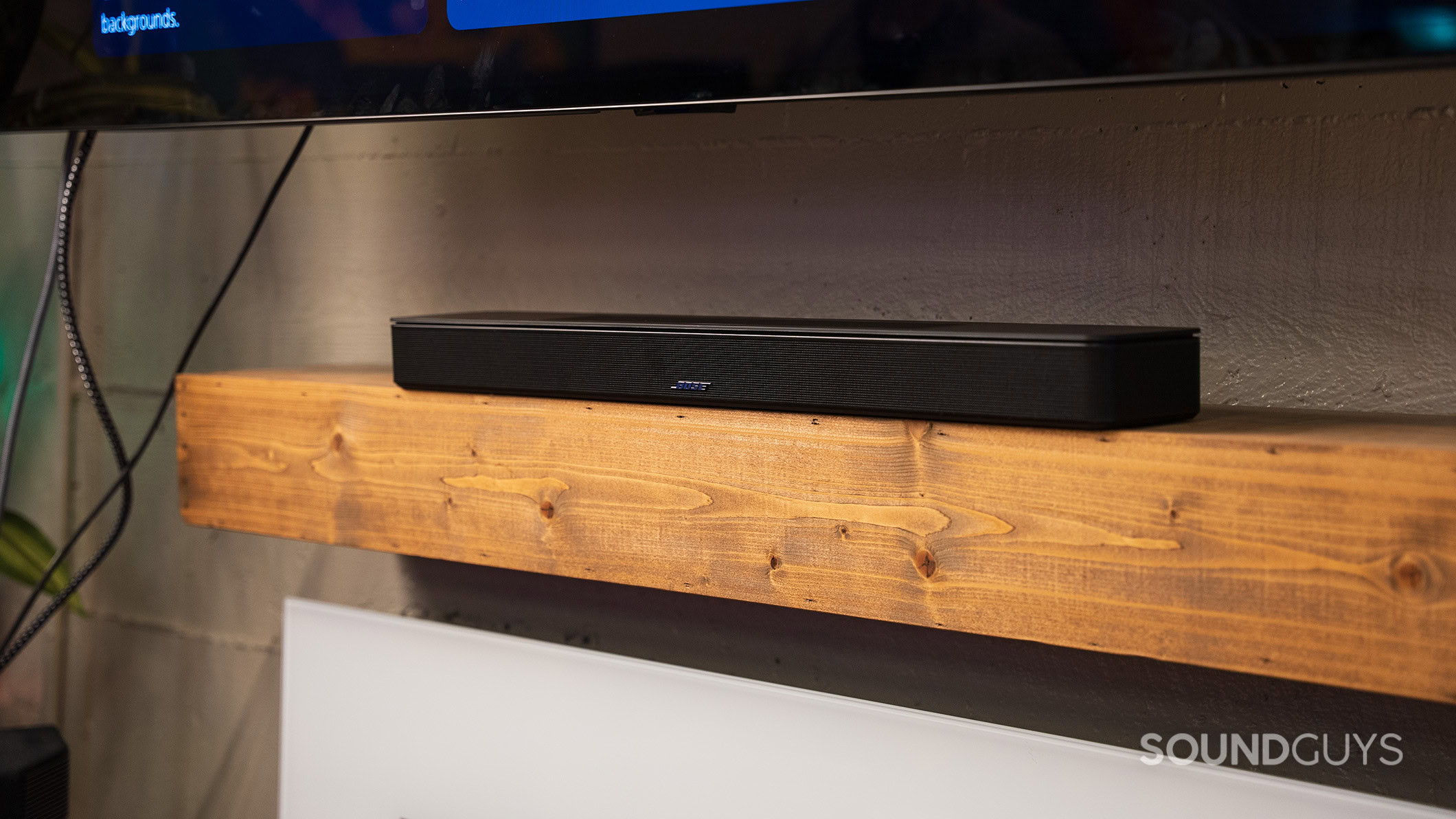 The Bose Smart Soundbar on a mantle.