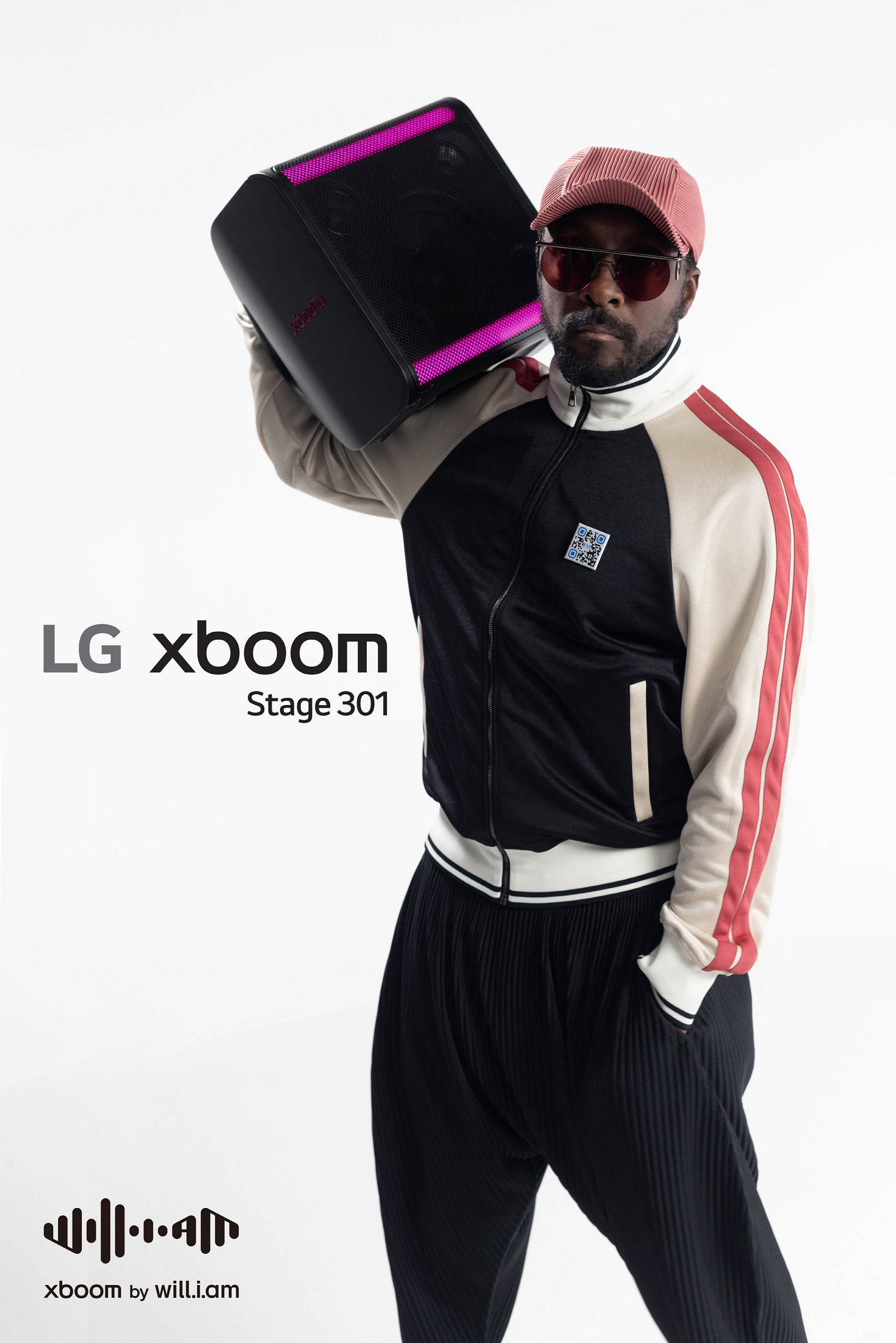 LG xboom Stage 301 held by will.i.am