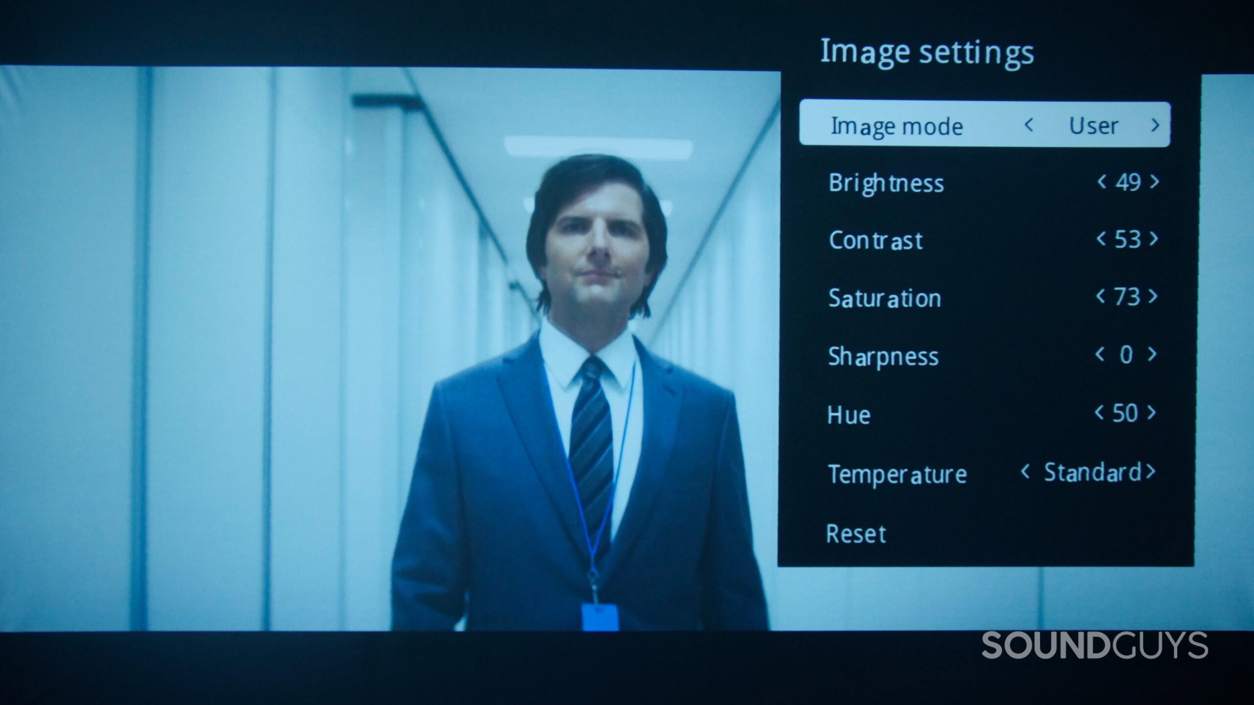 Adam Scott in Apple TV show Severance Season 1 projected using the Yaber L2s Projector with custom User Image Mode settings for optimal viewing