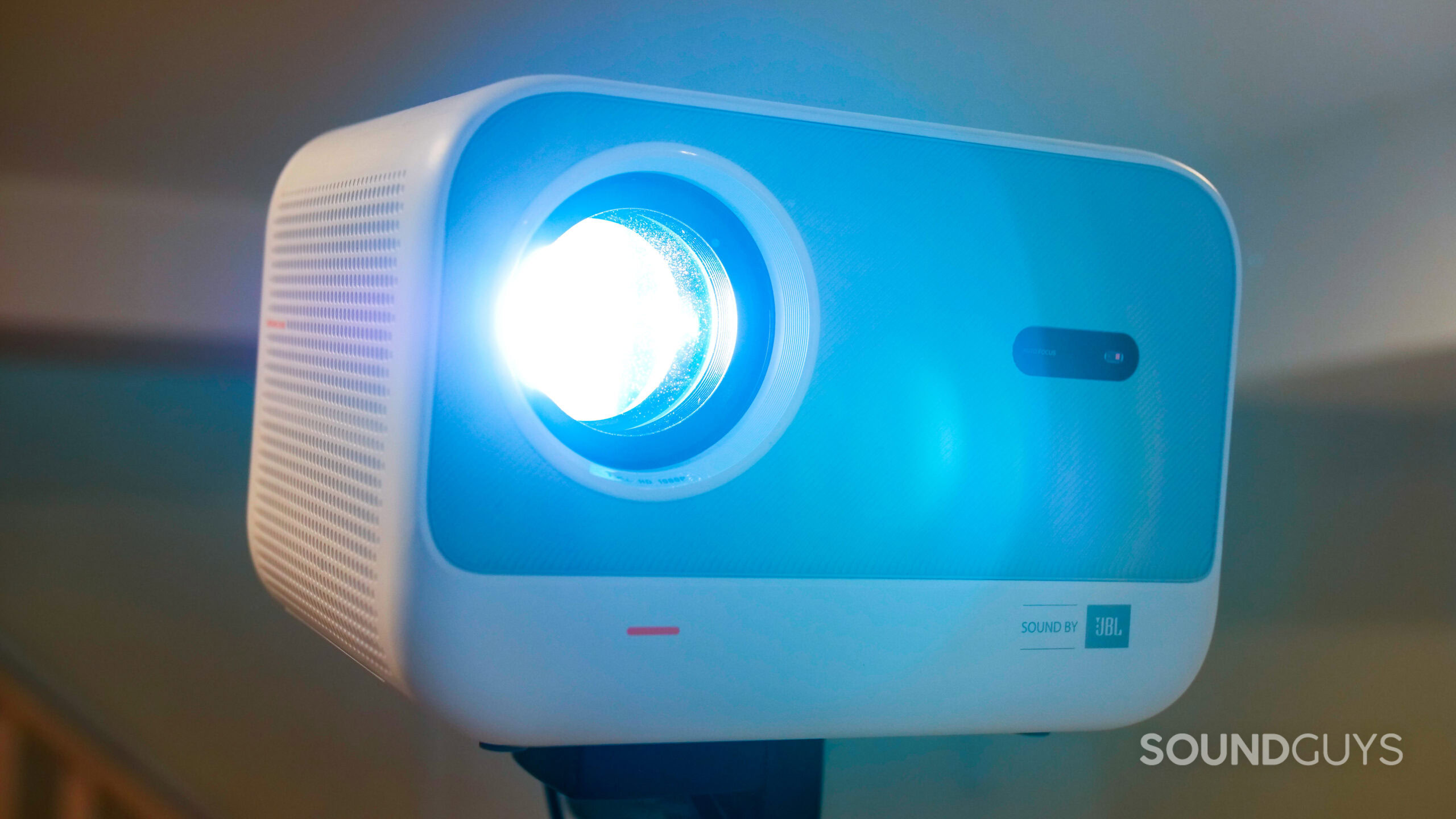 Yaber L2s Projector turned on in a home theater with the lights on